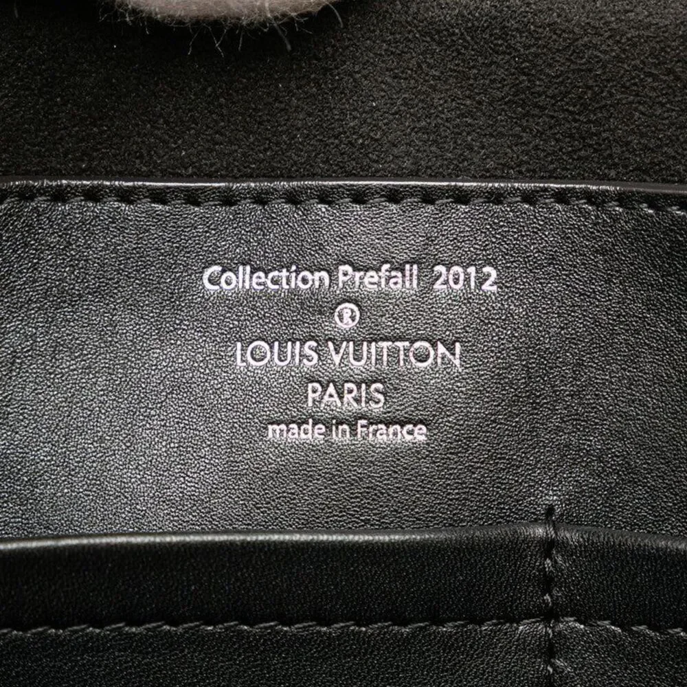 Louis Vuitton Monogram Revelation Neo Papillon GM Handbag